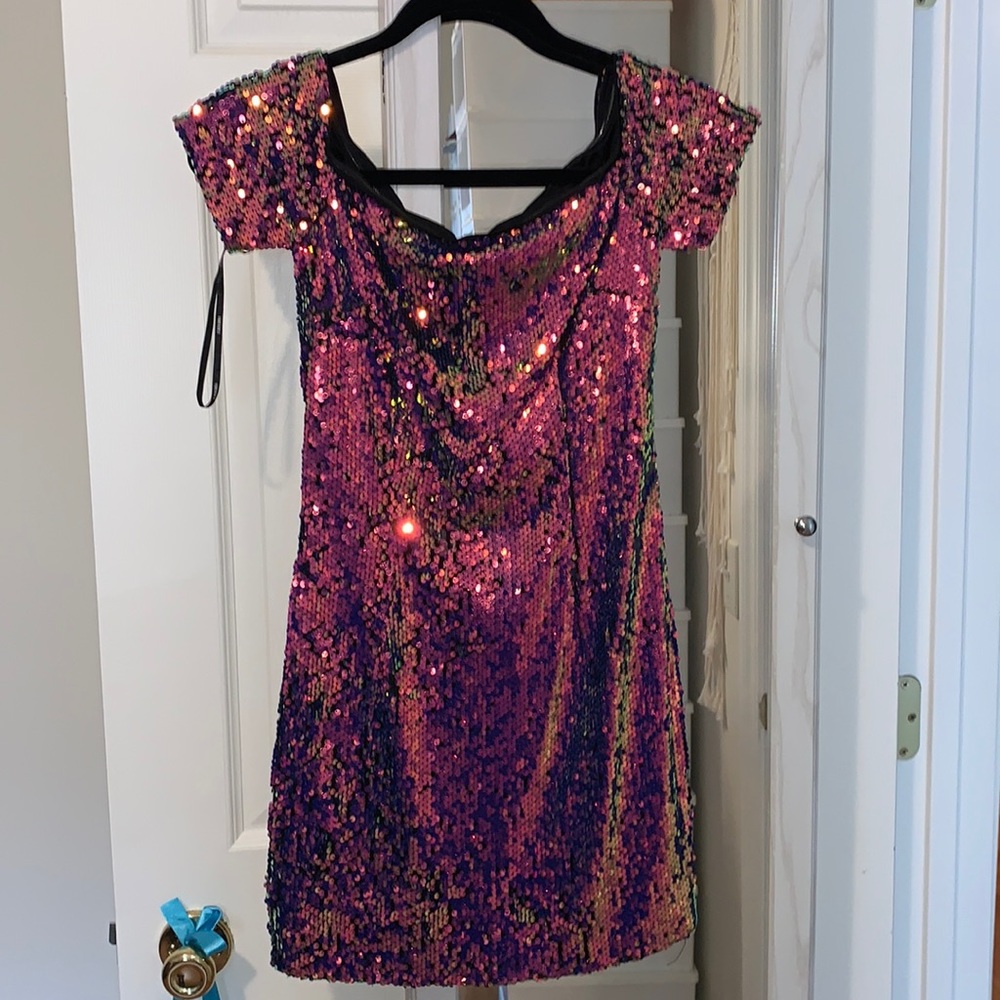 Beautifully colored dress. Never worn.